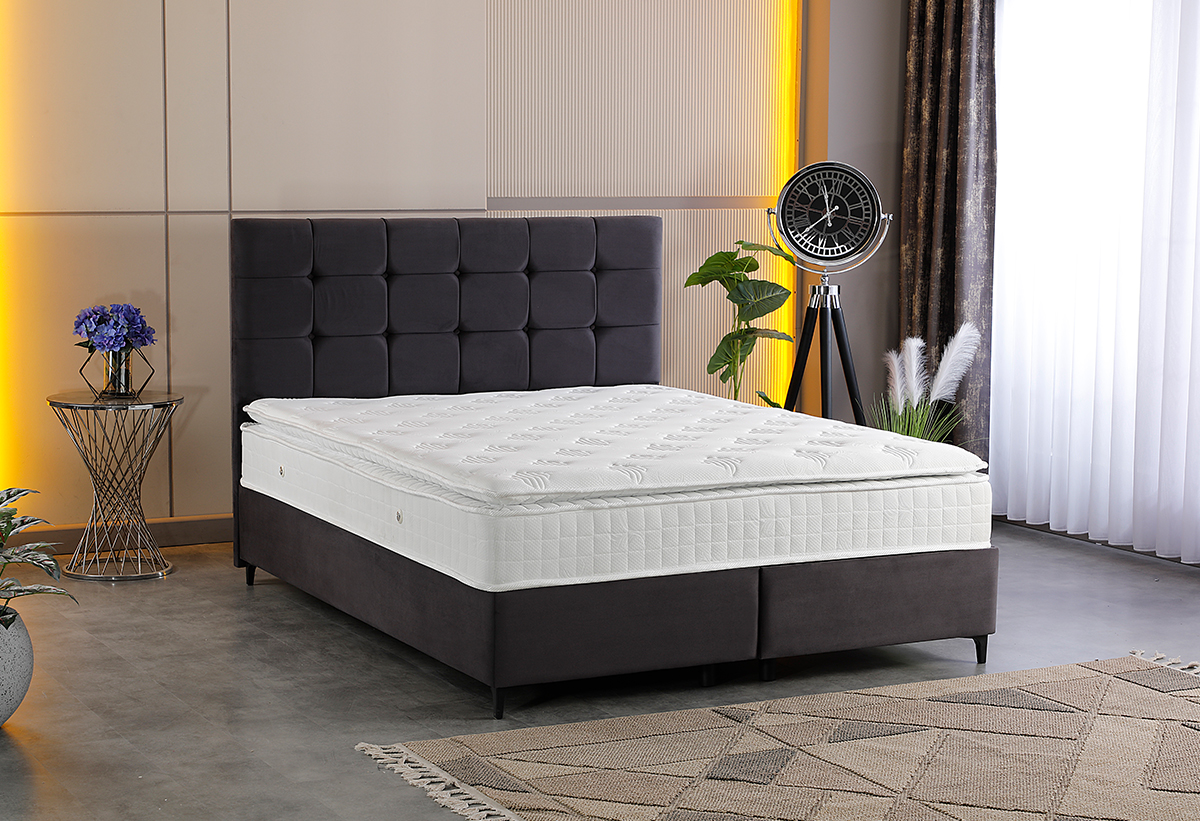 Απεικονίζεται το κρεβάτι με στρώμα. 